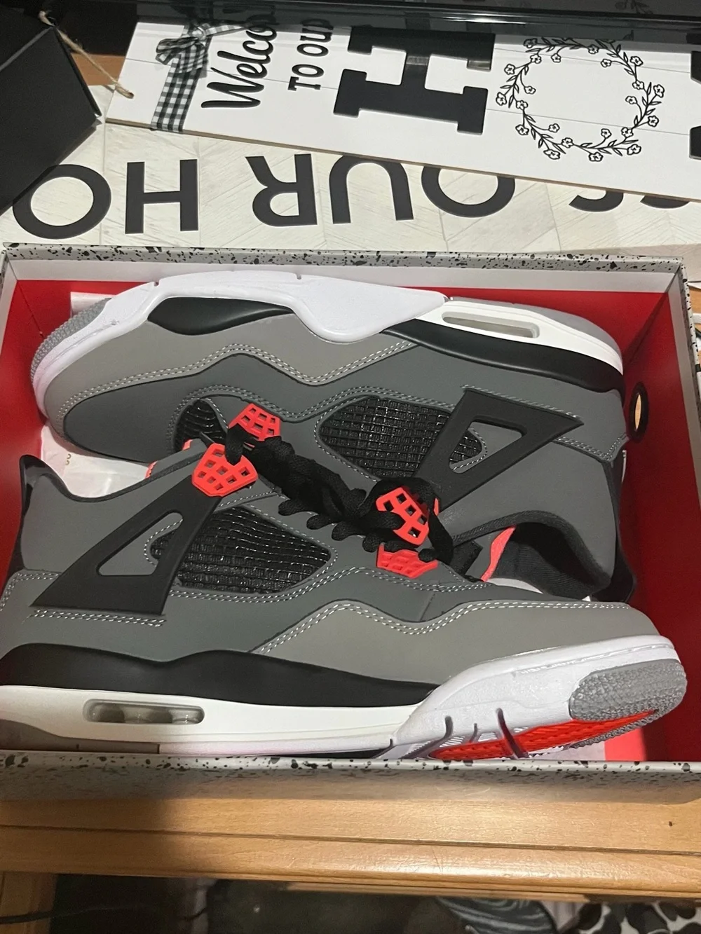 Jordan Retro 4 Sneakers in Grey, Black & Red Accent